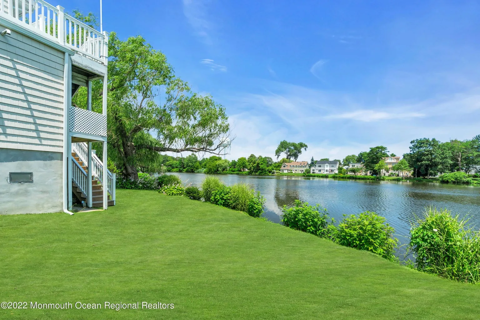Side yard with pond view